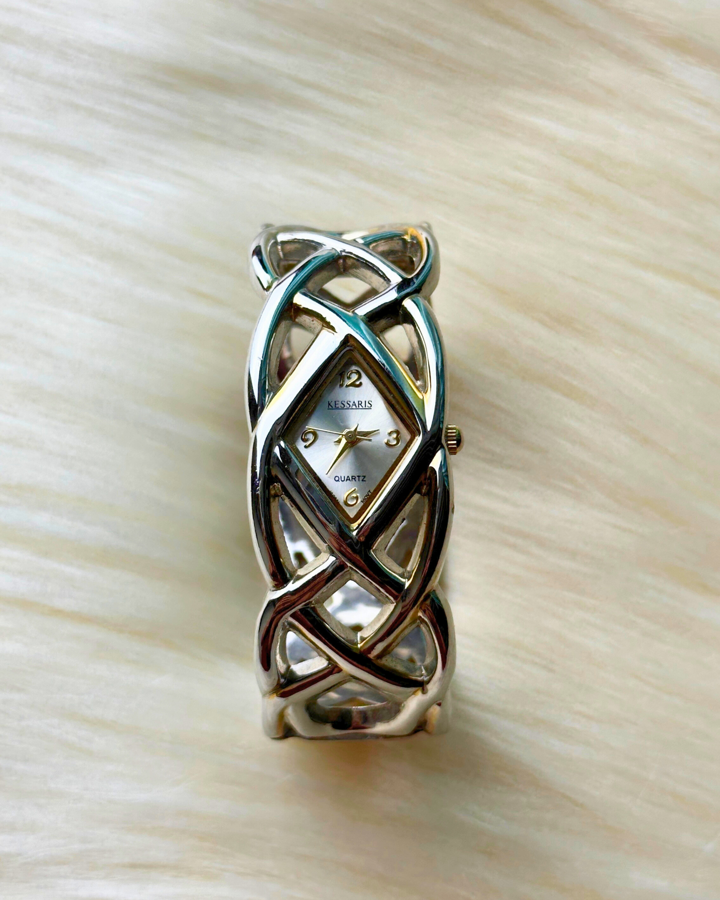 Vintage Kessaris Ladies’ Silver-Tone Openwork Bangle Quartz Watch – Petite Diamond-Shaped Dial