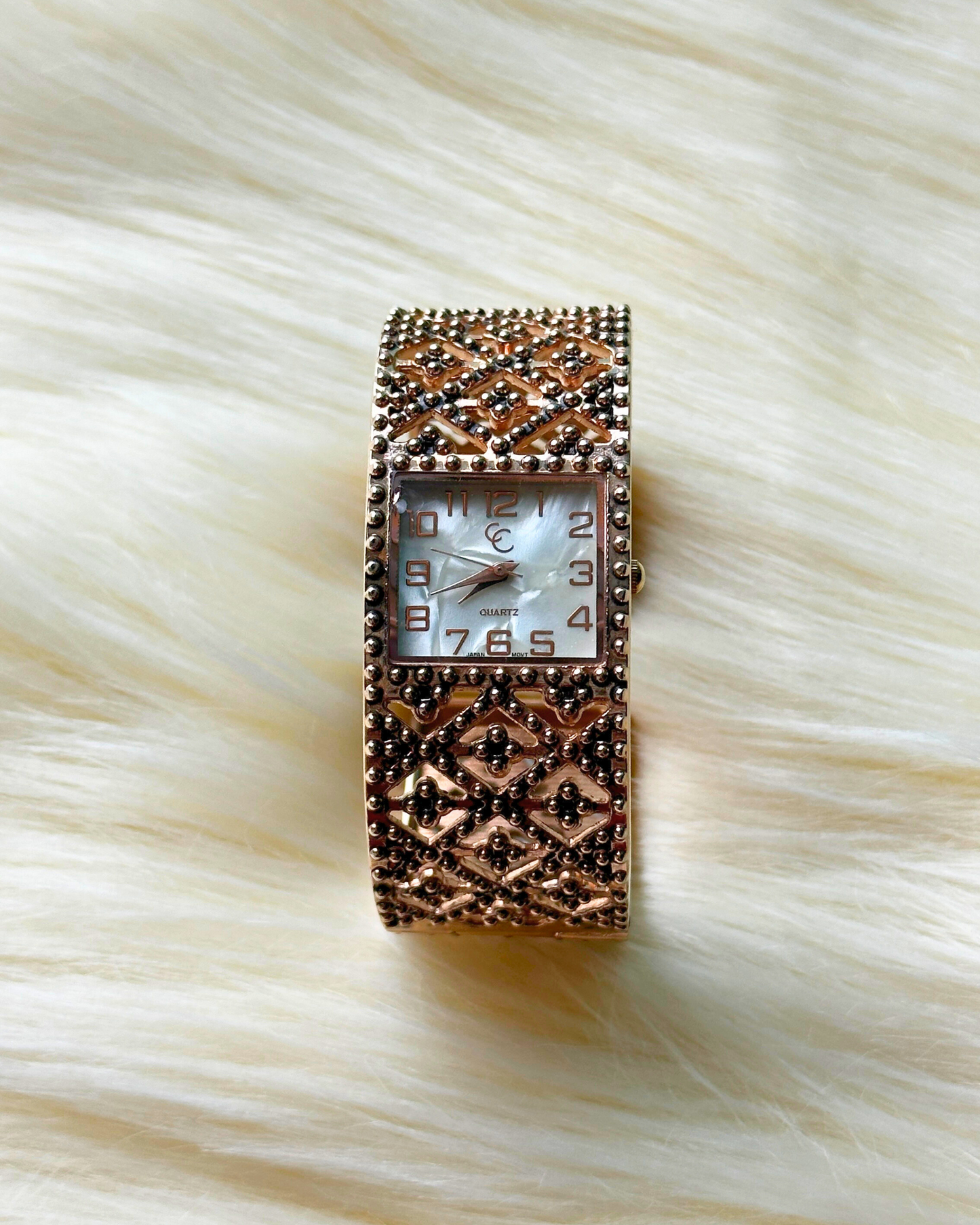 Vintage C Brand Ladies’ Bronze-Tone Textured Bangle Quartz Watch – Mother-of-Pearl Dial