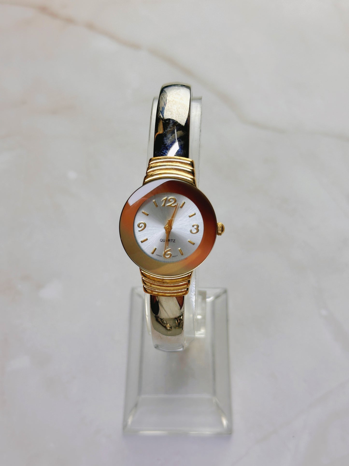 Vintage Quartz Bangle Watch – Gold Tone with Amber-Tone Bezel Accent