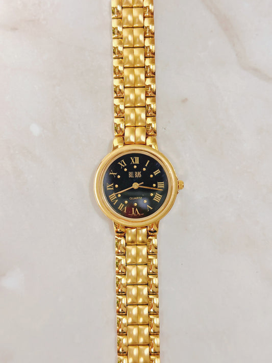 Bill Blass Women’s Gold-Tone Watch – Black Dial – Roman Numerals – Quartz Classic