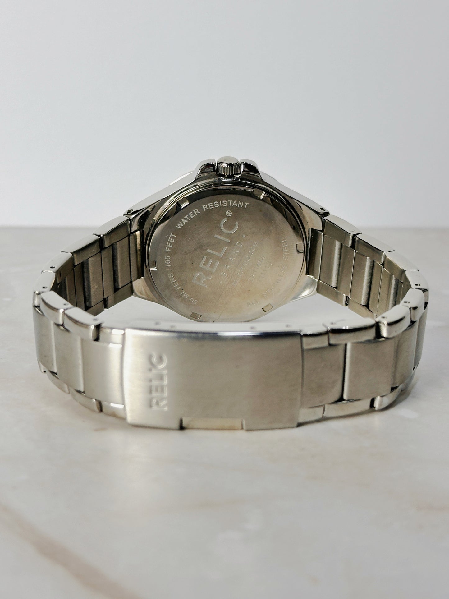 Relic Stainless Steel Date Watch – Silver Sunburst Dial – 165 ft Water Resistant