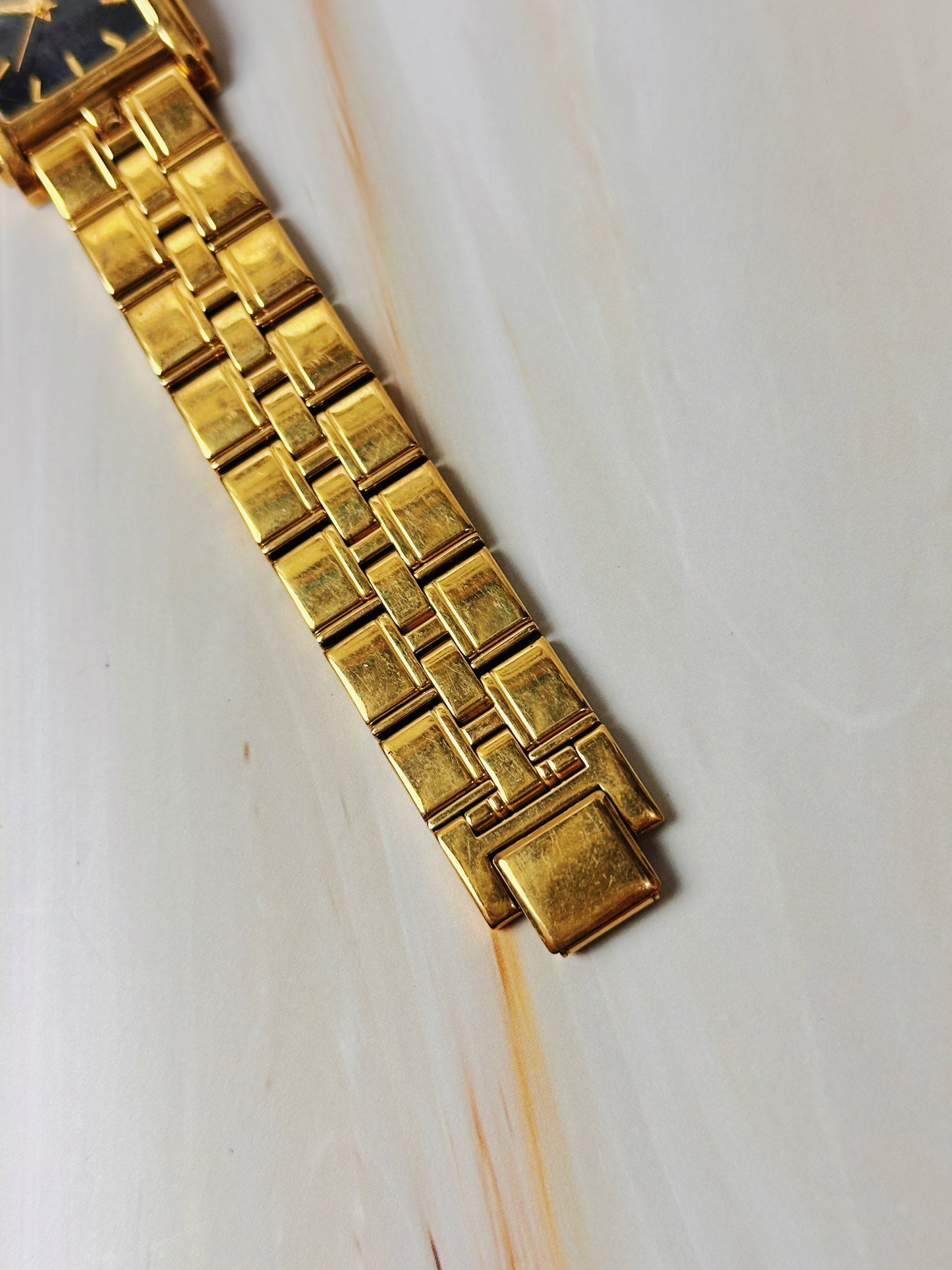 Caravelle by Bulova Women’s Gold Tone Tank Style Watch – Black Dial – Quartz Dress Watch