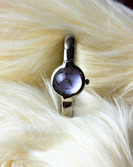 Vintage Rumours Ladies’ Silver-Tone Bangle Quartz Watch – Lavender Dial
