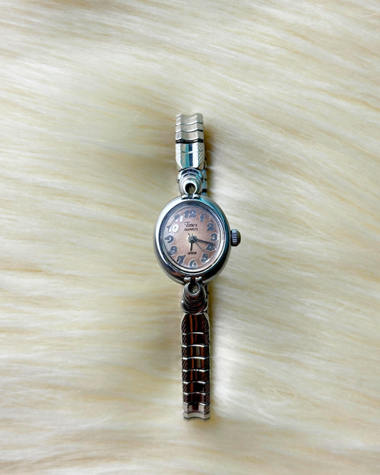 Vintage Timex Ladies’ Silver-Tone Stretch Band Quartz Watch – Rose-Tone Dial