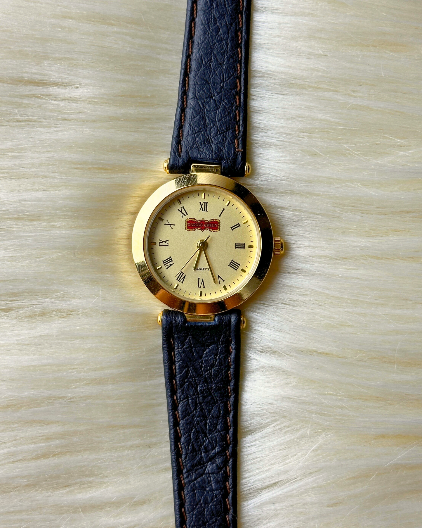 Vintage Casino Queen Ladies’ Gold-Tone Quartz Watch – Champagne Roman Dial