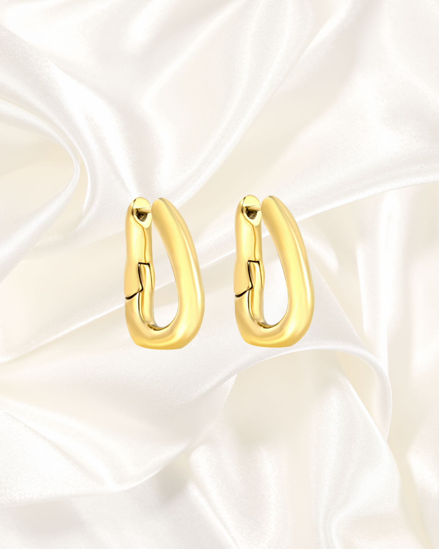 Sleek Oval Huggie Hoop Earrings