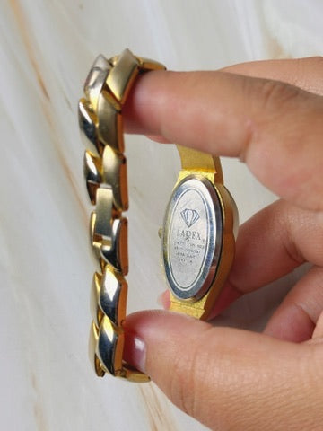 Larex Women’s Bangle Watch – Quartz – Two Tone Gold & Silver