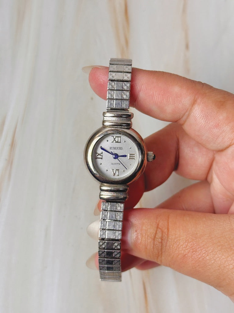 Rumours Ladies Watch – Silver Tone – Roman Numerals – Stretch Bracelet