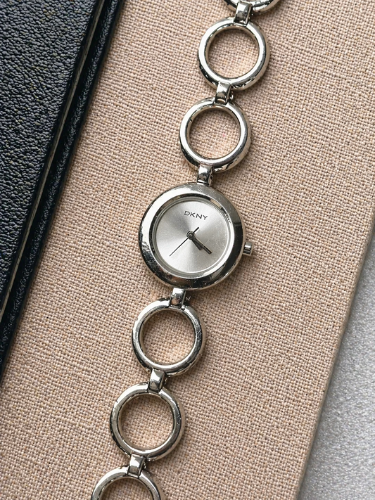 DKNY Silver Tone Bracelet Watch – Modern Circle Link Design – Minimalist Dial – New Battery