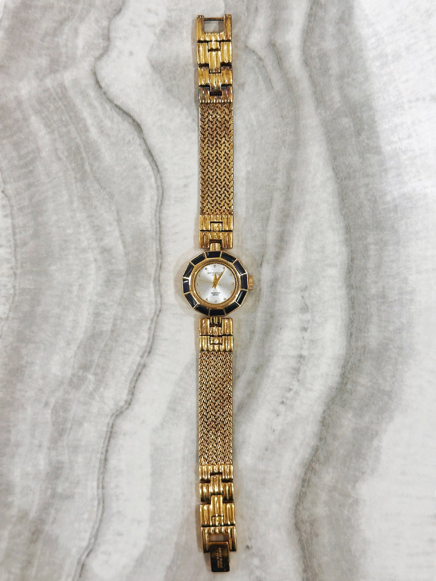 Anne Klein New York Diamond Swiss Quartz Watch – Mother of Pearl Dial with Black & Gold Bezel (WR 30M)