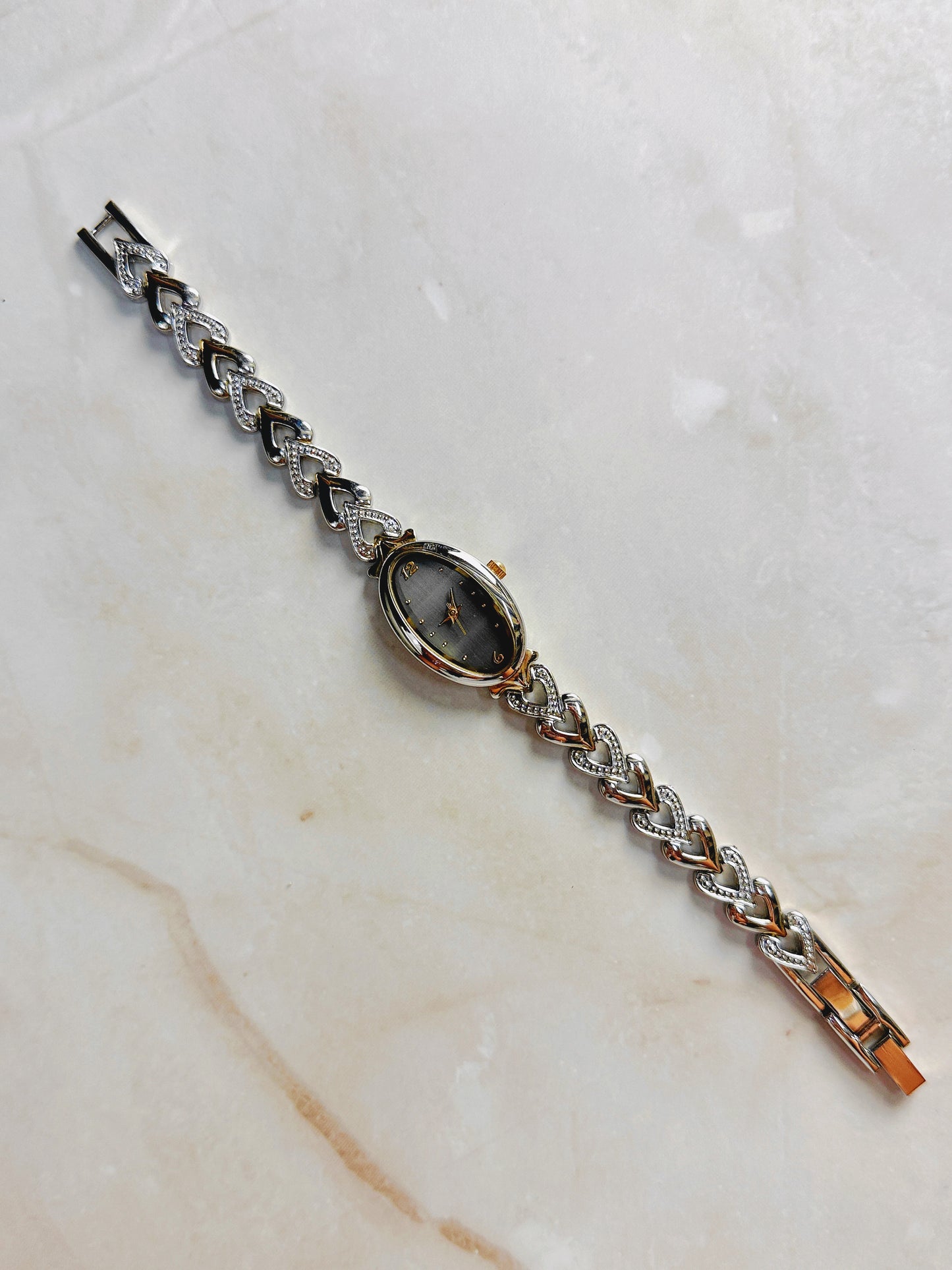 Quartz Oval Watch – Black Dial with Two-Tone Heart Link Bracelet (WR 30M)