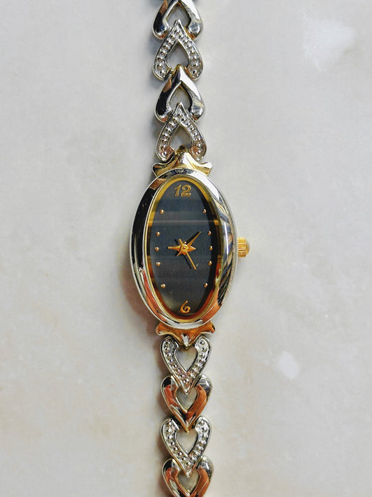 Quartz Oval Watch – Black Dial with Two-Tone Heart Link Bracelet (WR 30M)