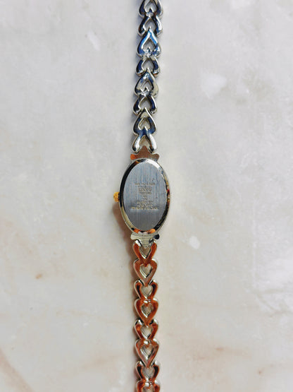 Quartz Oval Watch – Black Dial with Two-Tone Heart Link Bracelet (WR 30M)