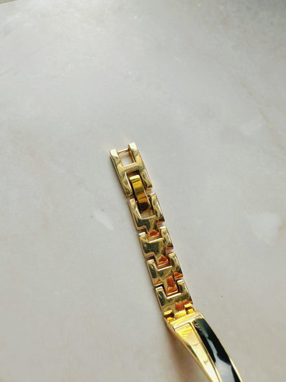Anne Klein Quartz Watch – Black Dial with Crystal Accents & Gold-Tone Bangle Bracelet (WR 30M)