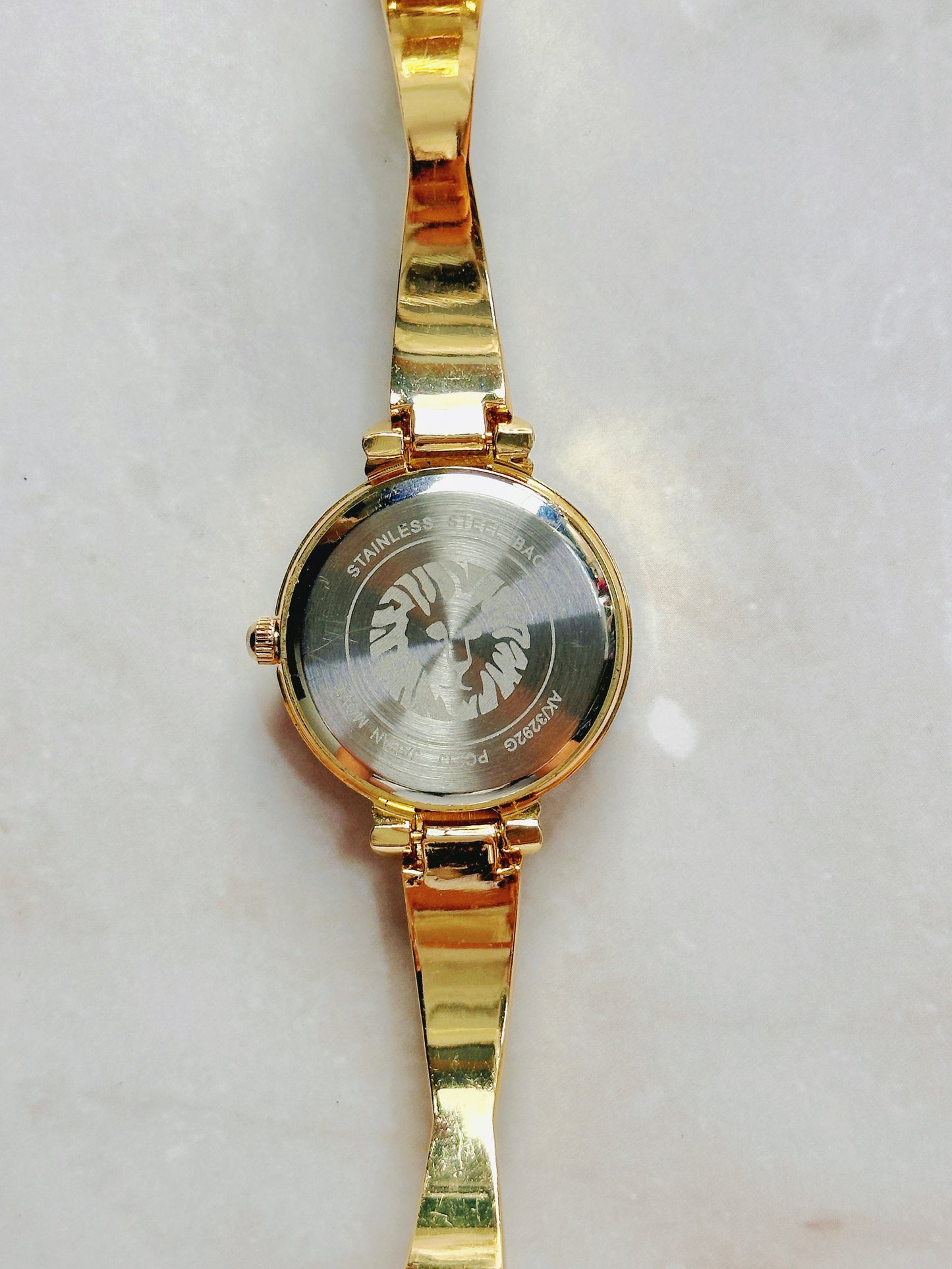 Anne Klein Quartz Watch – Black Dial with Crystal Accents & Gold-Tone Bangle Bracelet (WR 30M)