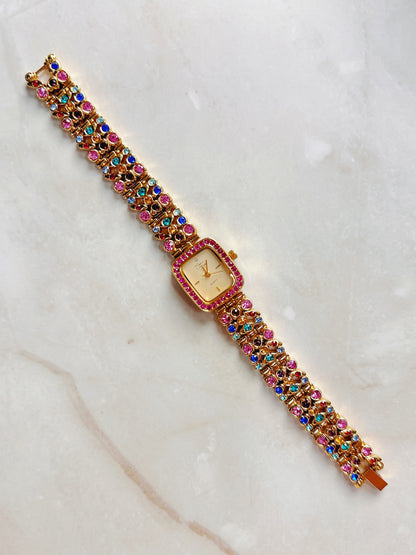 Suzanne Somers Quartz Watch – Gold Dial with Pink Crystal Bezel & Multicolor Gem Bracelet (WR 30M)