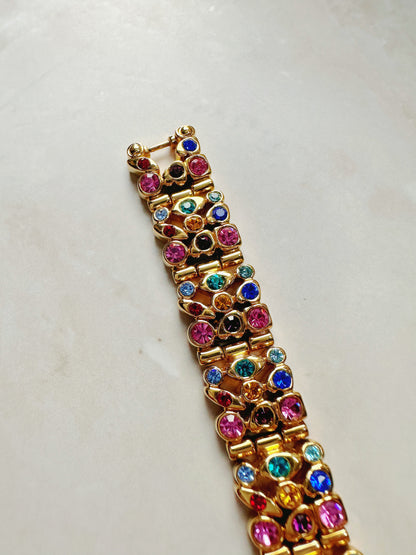 Suzanne Somers Quartz Watch – Gold Dial with Pink Crystal Bezel & Multicolor Gem Bracelet (WR 30M)