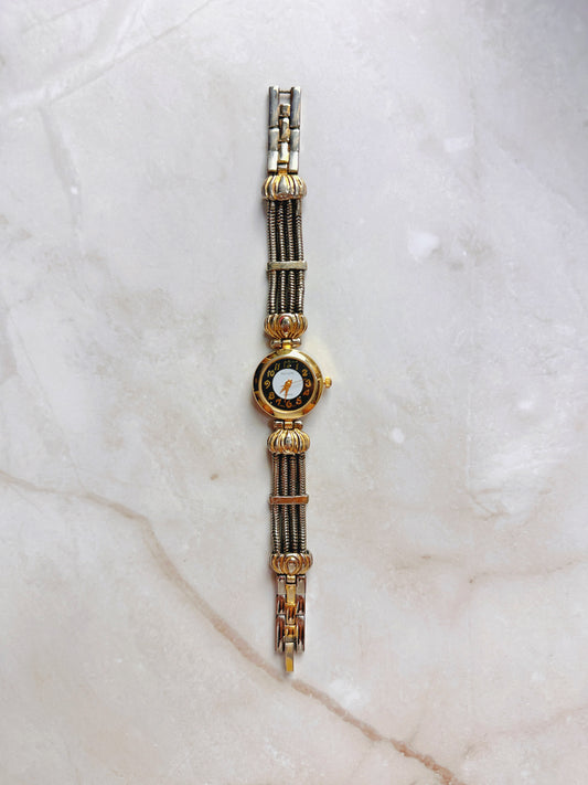 Revlon Quartz Watch – Black & White Dial with Two-Tone Multi-Strand Bracelet (WR 30M)