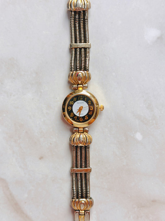 Revlon Quartz Watch – Black & White Dial with Two-Tone Multi-Strand Bracelet (WR 30M)