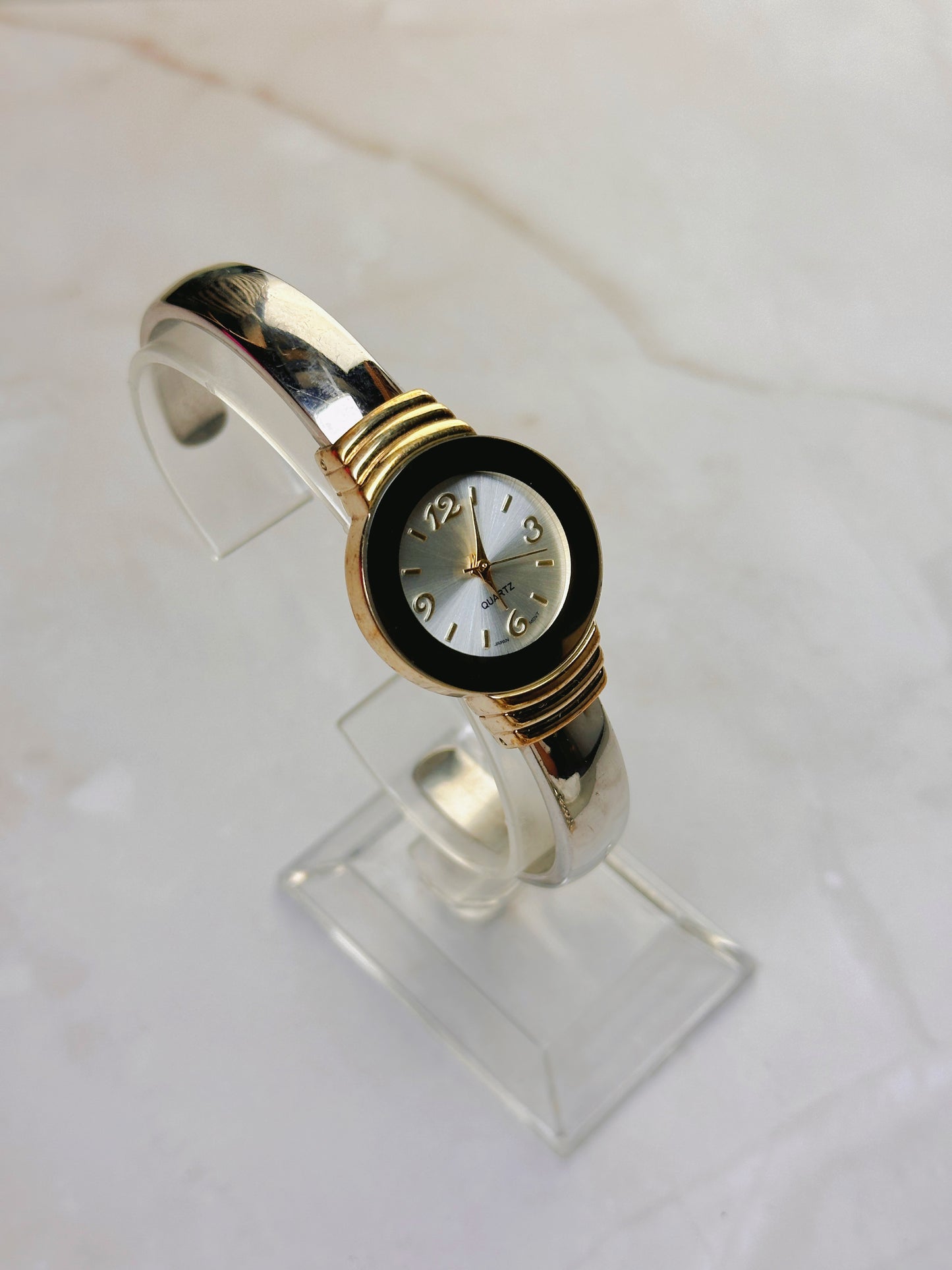 Vintage Quartz Bangle Watch – Gold Tone with Amber-Tone Bezel Accent