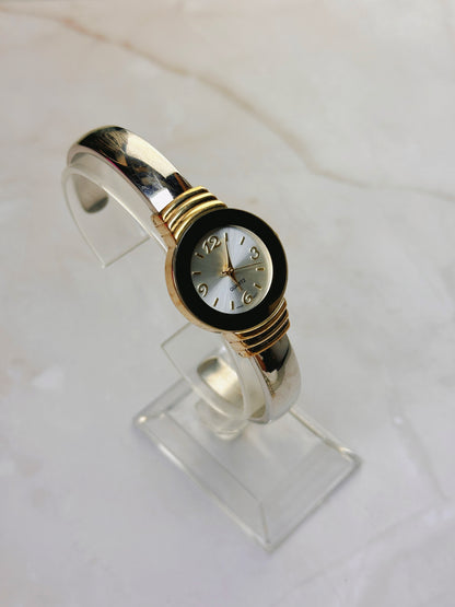 Vintage Quartz Bangle Watch – Gold Tone with Amber-Tone Bezel Accent