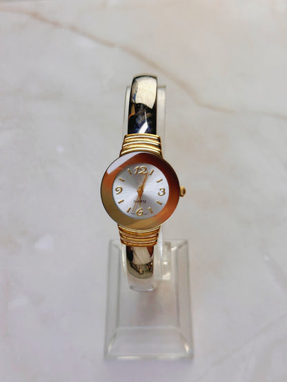Vintage Quartz Bangle Watch – Gold Tone with Amber-Tone Bezel Accent