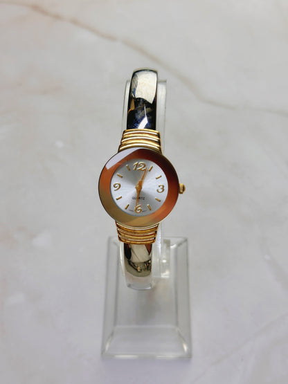 Vintage Quartz Bangle Watch – Gold Tone with Amber-Tone Bezel Accent