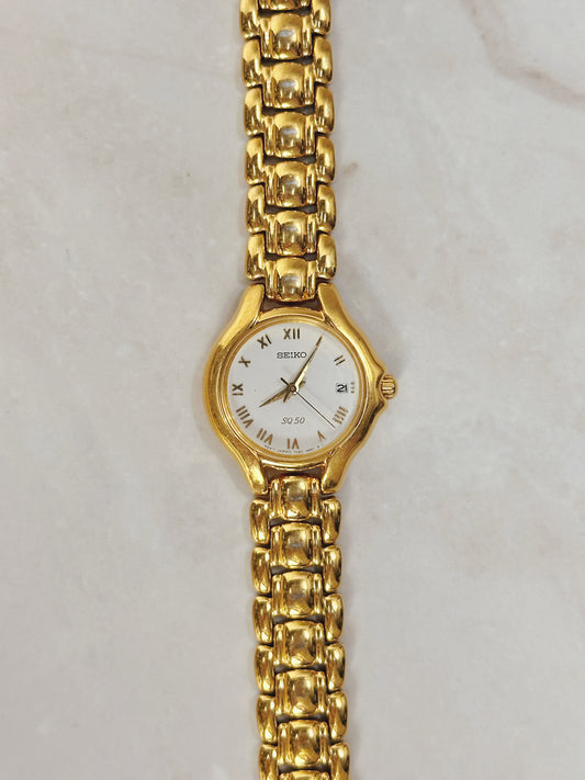 Seiko SQ50 Gold-Tone Date Watch – Roman Numerals – Quartz