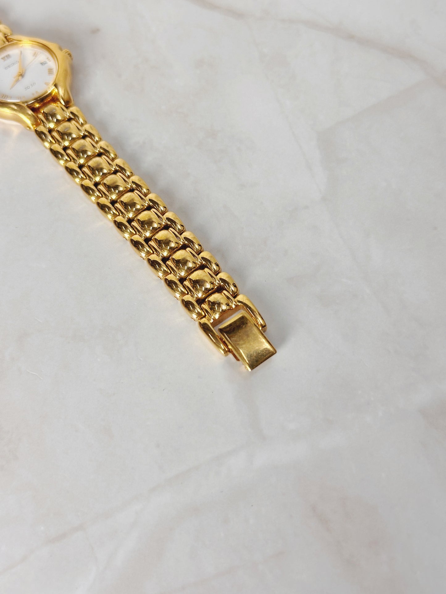 Seiko SQ50 Gold-Tone Date Watch – Roman Numerals – Quartz