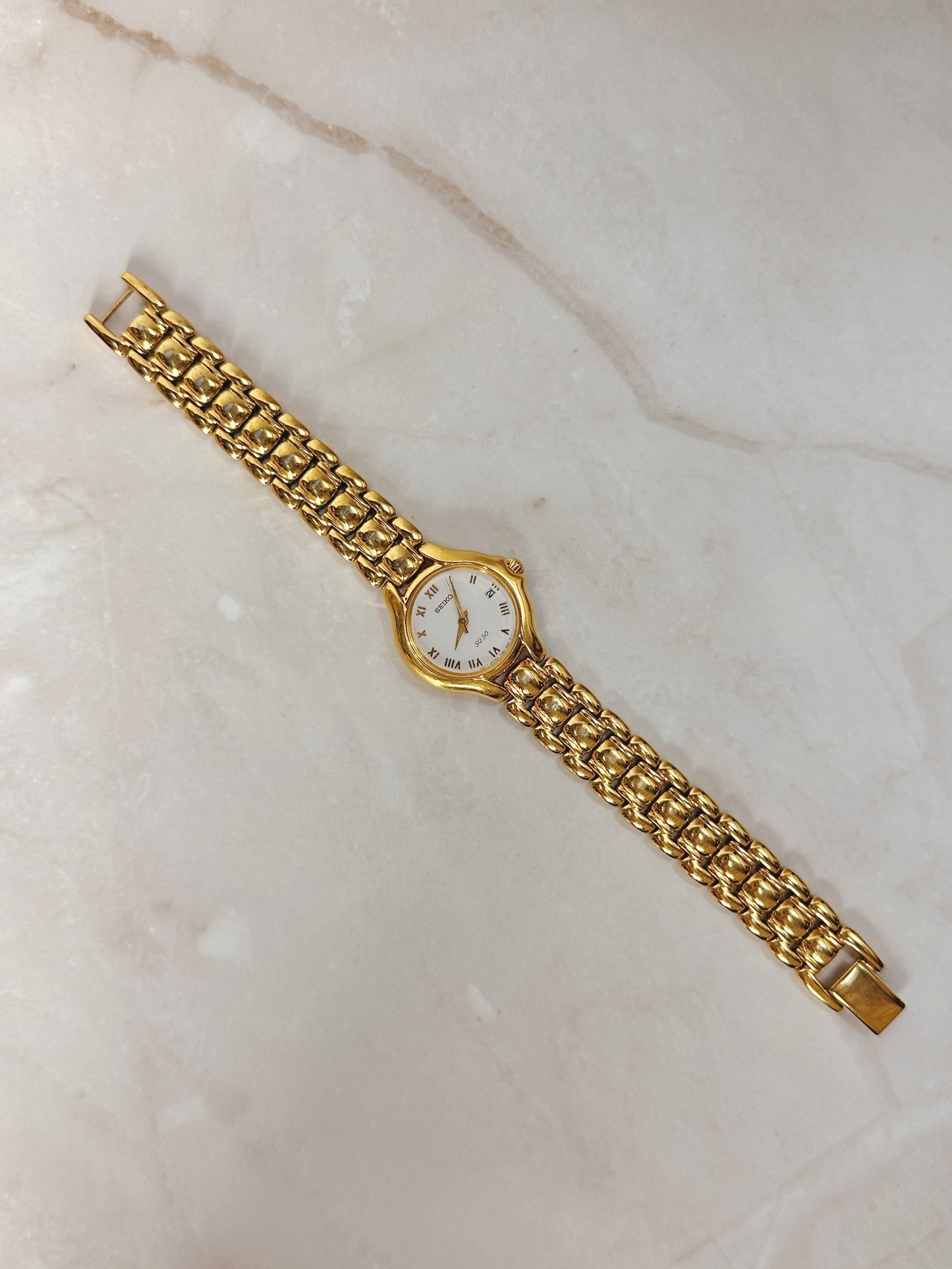 Seiko SQ50 Gold-Tone Date Watch – Roman Numerals – Quartz