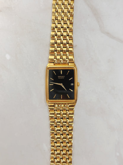 Seiko Rectangular Gold-Tone Watch – Black Dial – Date Window – Classic Dress Style – Quartz