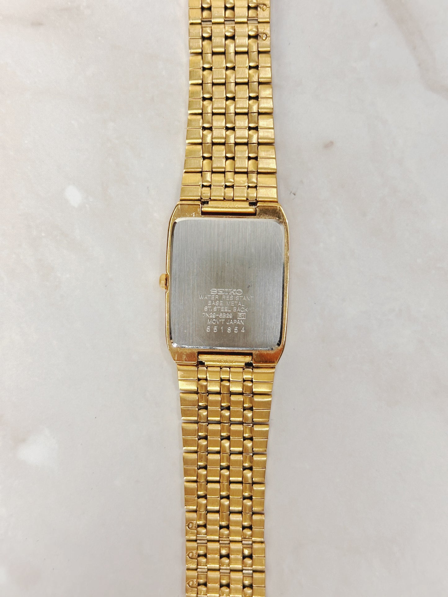 Seiko Rectangular Gold-Tone Watch – Black Dial – Date Window – Classic Dress Style – Quartz