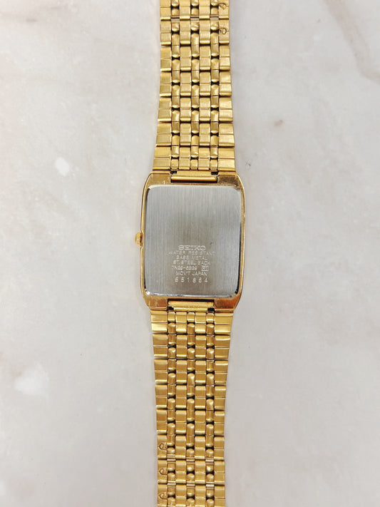 Seiko Rectangular Gold-Tone Watch – Black Dial – Date Window – Classic Dress Style – Quartz