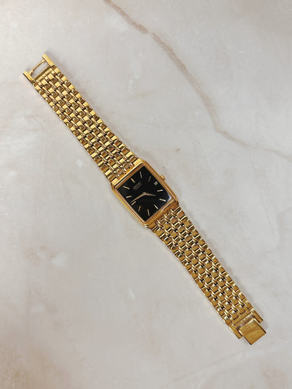 Seiko Rectangular Gold-Tone Watch – Black Dial – Date Window – Classic Dress Style – Quartz