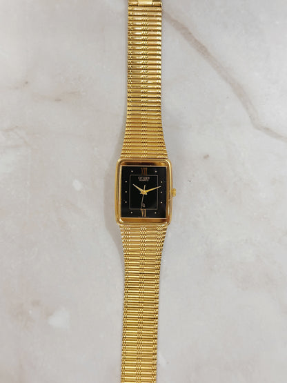 Citizen Petite Rectangular Gold-Tone Watch – Black Dial Roman Numerals – Slim Textured Bracelet – Quartz