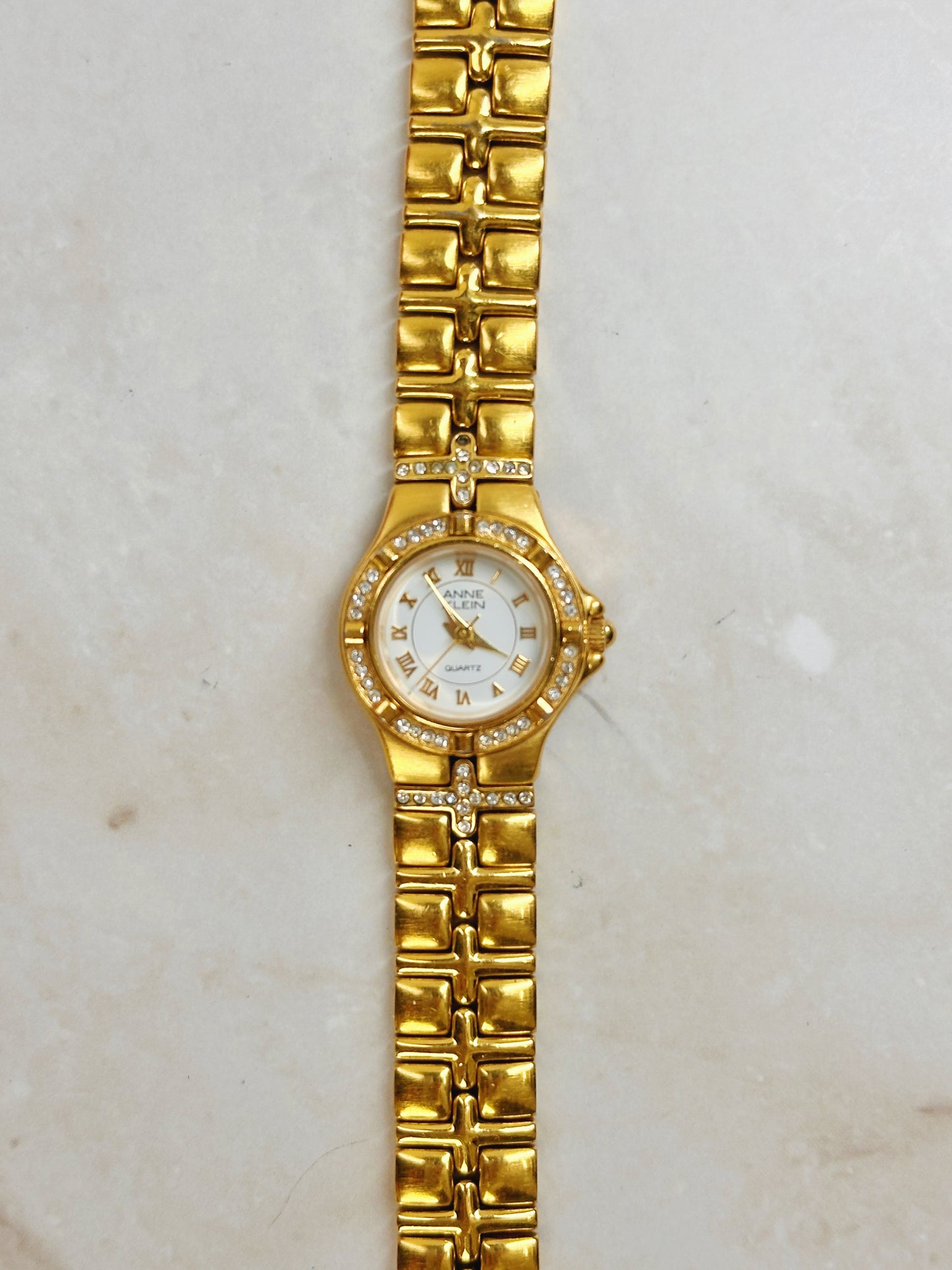 Anne Klein Gold-Tone Crystal Bezel Watch – Roman Numerals – Quartz – Elegant Ladies