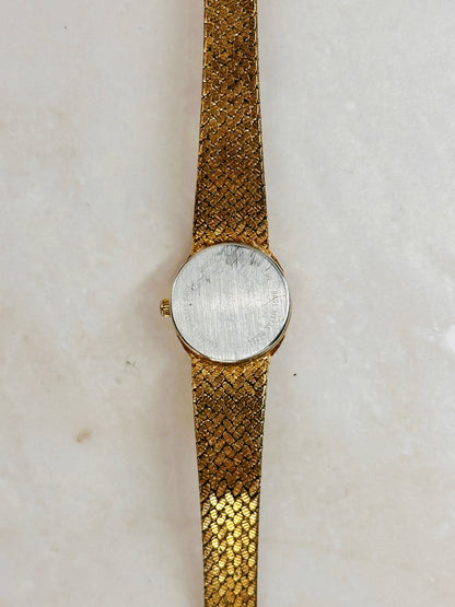 Bulova Petite Oval Gold-Tone Watch – Black Dial – Diamond Accent – Woven Bracelet