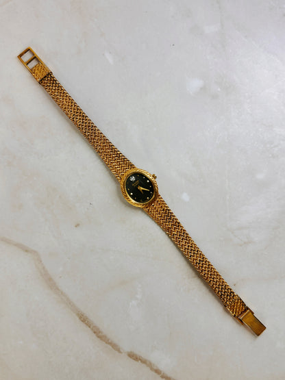 Bulova Petite Oval Gold-Tone Watch – Black Dial – Diamond Accent – Woven Bracelet