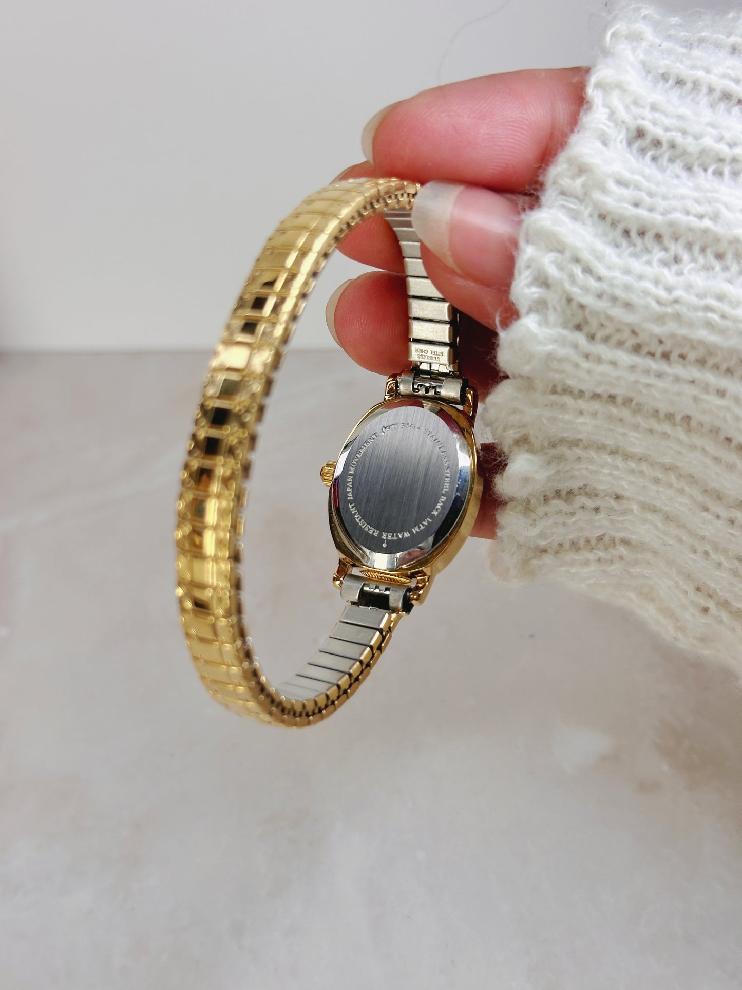 Rushmore Petite Oval Gold-Tone Watch – Black Dial – Floral Accent – Vintage Stretch Bracelet