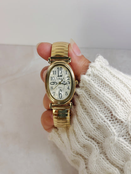 Collezioni Petite Oval Gold-Tone Watch – White Dial Arabic Numerals – Stretch Bracelet