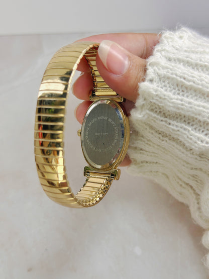 Collezioni Petite Oval Gold-Tone Watch – White Dial Arabic Numerals – Stretch Bracelet