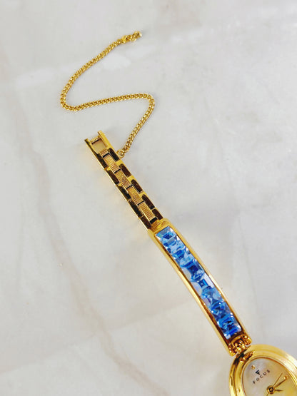 Focus Gold Tone Bracelet Watch – Blue Crystal Accents – Oval Dial – Quartz – New Battery