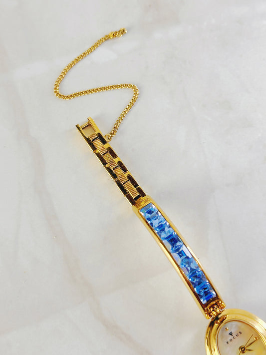 Focus Gold Tone Bracelet Watch – Blue Crystal Accents – Oval Dial – Quartz – New Battery