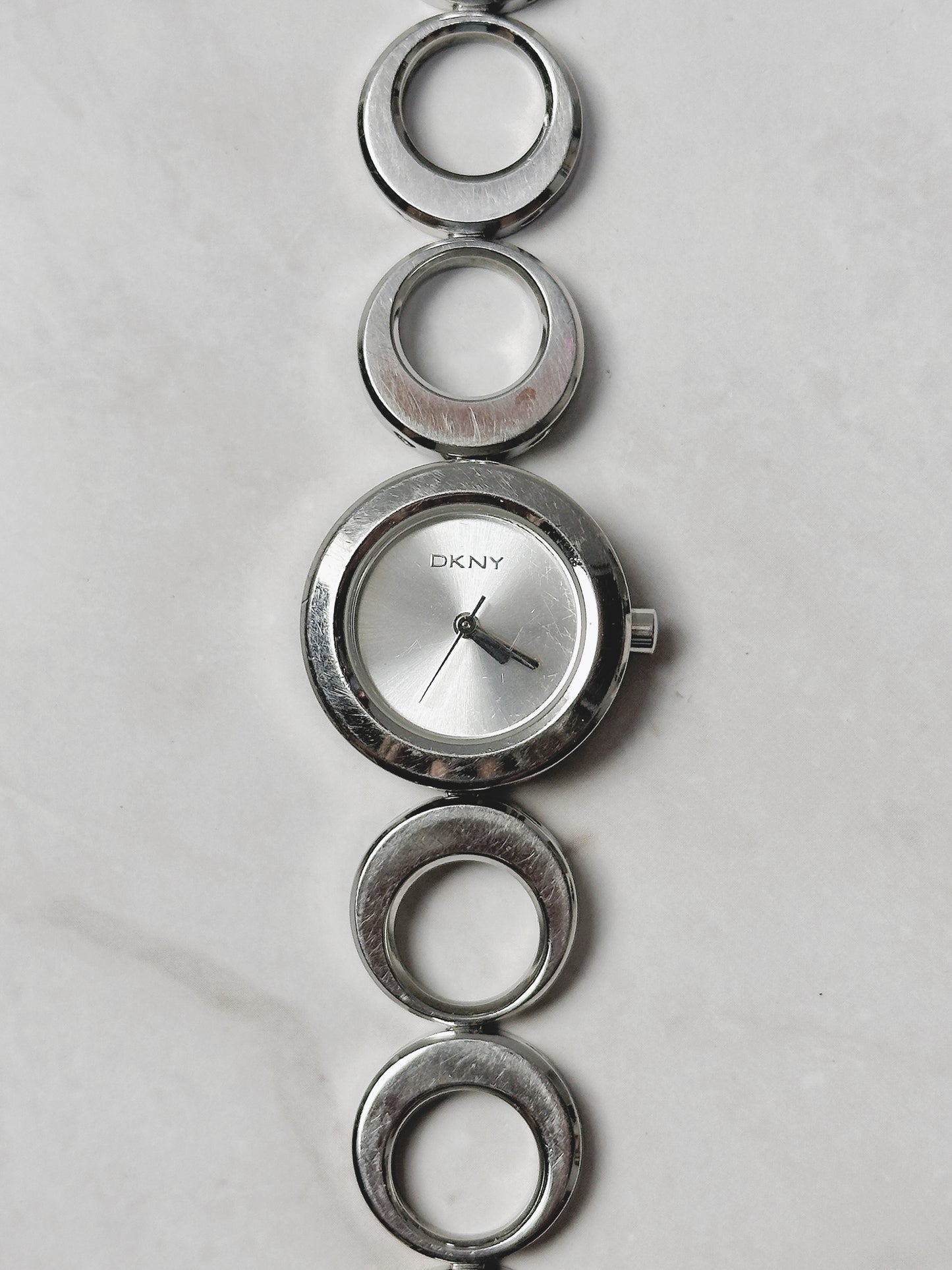 DKNY Silver Tone Bracelet Watch – Modern Circle Link Design – Minimalist Dial – New Battery