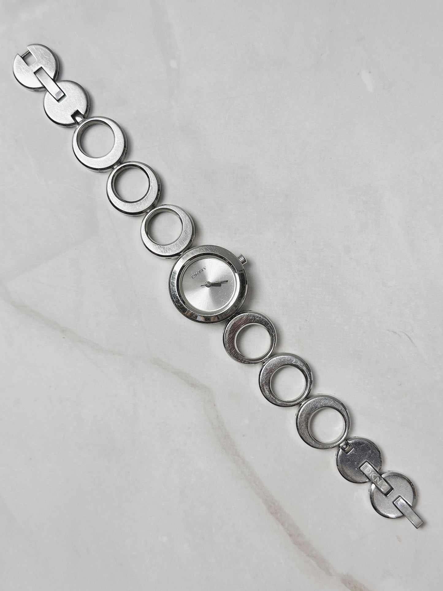 DKNY Silver Tone Bracelet Watch – Modern Circle Link Design – Minimalist Dial – New Battery