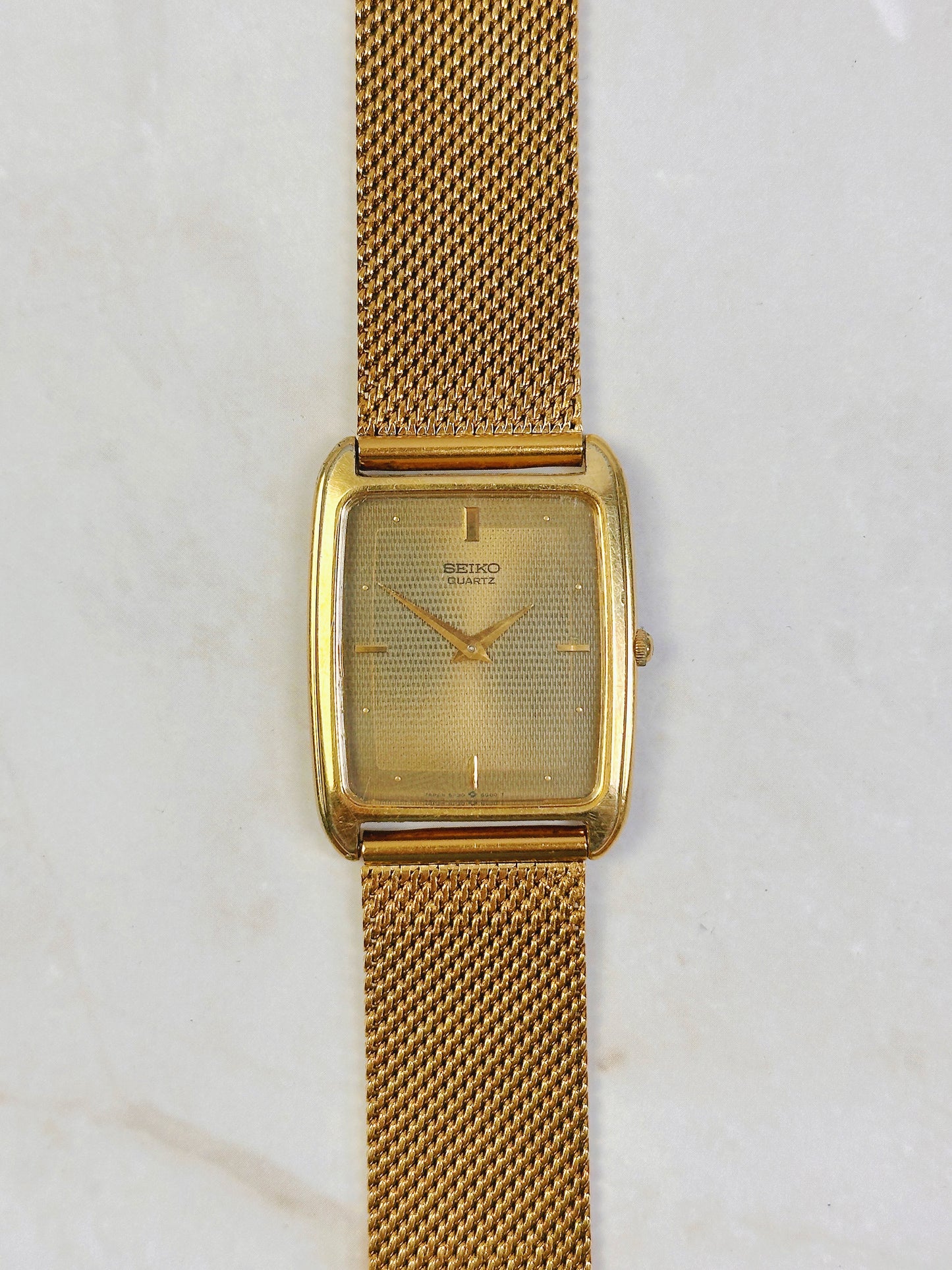 Seiko Quartz Gold-Tone Rectangular Watch – Textured Dial – Mesh Bracelet