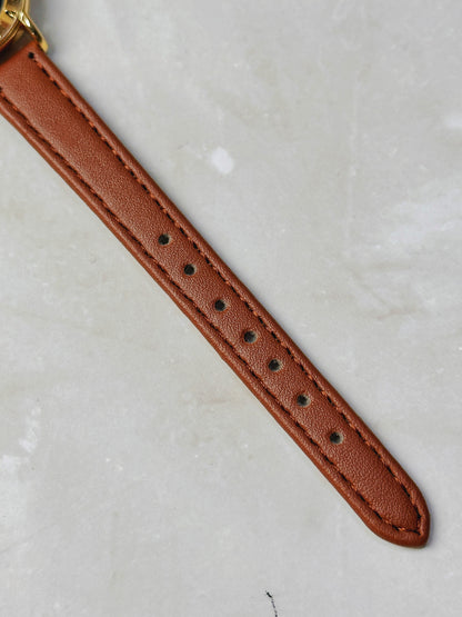 Ouwook Roman Numeral Bezel Watch – Gold Tone Case – Black Dial – Brown Leather Strap – Quartz – New Battery