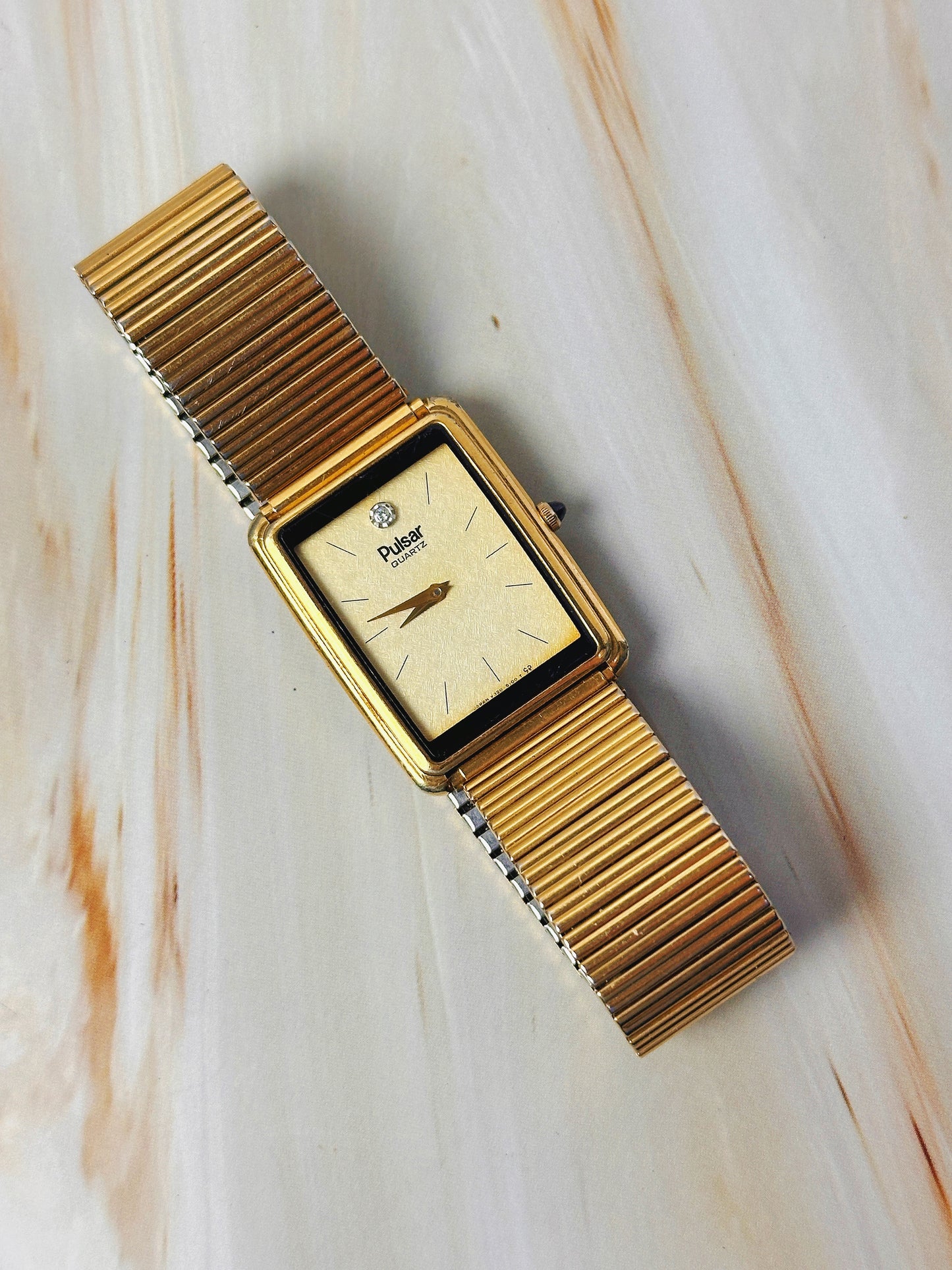 Pulsar Women’s Gold Tone Tank Style Watch – Diamond Accent Dial – Quartz Dress Watch