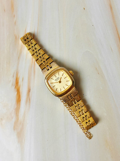 Seiko Women’s Gold Tone Cushion Dress Watch – Vintage Quartz – Integrated Bracelet