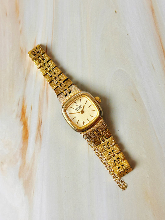 Seiko Women’s Gold Tone Cushion Dress Watch – Vintage Quartz – Integrated Bracelet